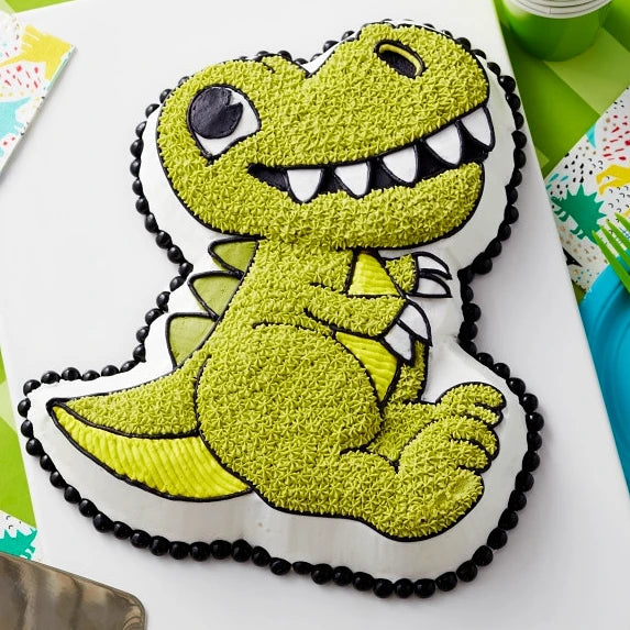 Dinosaur cake 2025 pan wilton